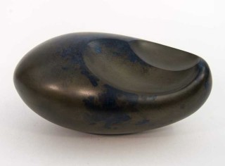 The undulating gentle curves of this sculpture by artist Jana Osterman emulate organic egg shaped forms found in nature.