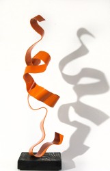 A ribbon of painted orange steel appears unwind and bounce off its base in this playful sculpture by Mark Birksted.