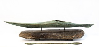 This bronze kayak is created using the lost-wax sculpting method.