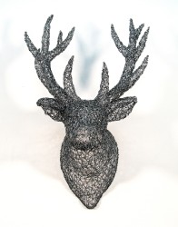 The majesty of a male deer is captured in this unique wall sculpture by Canadian artist Sophia DeFrancesca.